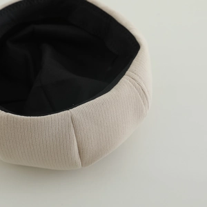 Kids cute beige cat ear beret with vertical stripe texture and soft black lining