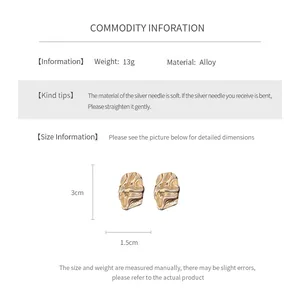 Size chart showing irregular gold earrings with alloy material and 925 silver needle