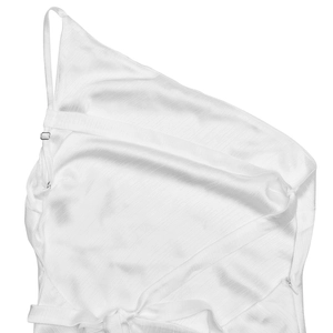 Close-up of white satin dress with elegant one-shoulder strap and adjustable metallic buckle
