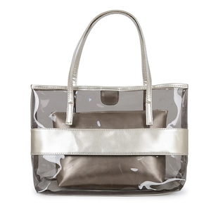 Clear PVC tote bag with gold trim and matching inner pouch for beach and daily commute