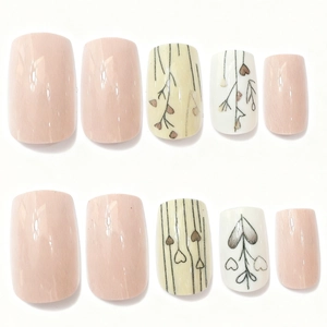 Minimalist square press-on nails with heart patterns and elegant stripe designs