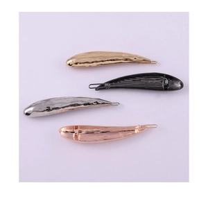 Hammered metal hair clips in gold, gun black, silver and rose gold colors with lava texture