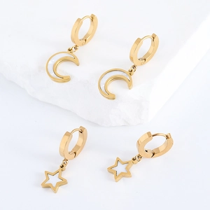 Gold stainless steel huggie earrings featuring crescent moon and star shell inlays