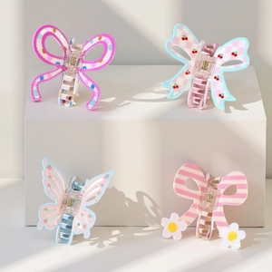 Set of four butterfly hair claws with cherry and floral prints for sweet summer hairstyling