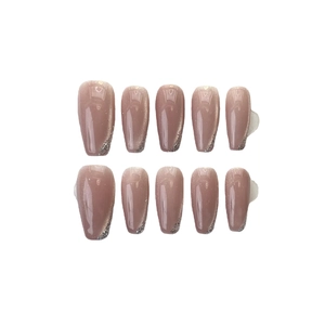 Handmade mauve cat-eye press-on nails with silver glitter tips and long coffin shape