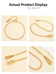 Detail view of golden metal waist chain featuring decorative rings and delicate fringe tassels
