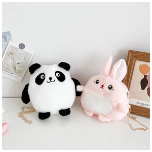 Detail of plush panda and bunny crossbody bags with elegant gold chain straps