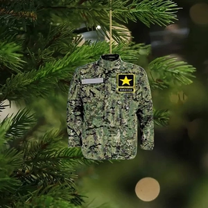 Detail of army camo uniform acrylic ornament hanging on a Christmas tree branch