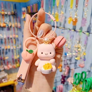 Cute pink cat keychain set with crown kitty, bell, peach charm and nail clipper