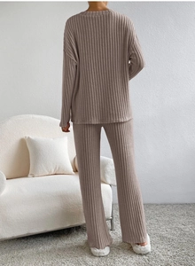 Detail of ribbed knit fabric on women's V-neck lounge set in brownish grey color