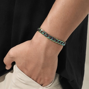 Rainbow Cuban link bracelet for men shown on wrist, featuring colorful metallic finish