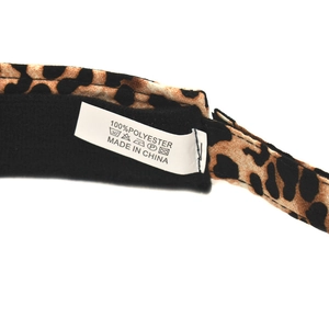 Leopard print open top sun visor with transparent PVC brim and polyester fabric details
