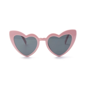 Detailed front view of pink heart-shaped party sunglasses with dark grey protective lenses