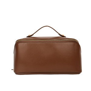 Grande trousse de maquillage en cuir marron avec poignée et fermeture éclair dorée