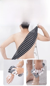 Close-up of double-sided exfoliating bath towel with striped mesh texture for back scrubbing