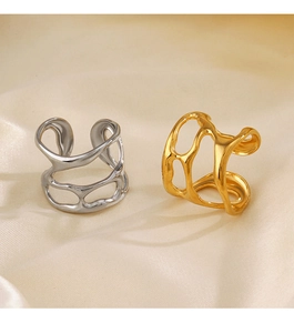 Detail showing irregular molten metal lava rings in gold and silver on silk fabric