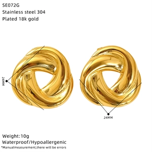 Detail view of 24mm twisted knot earrings in 18K gold plated stainless steel