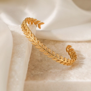 Elegant 18K gold plated stainless steel C-shaped cuff bracelet with textured leaf pattern