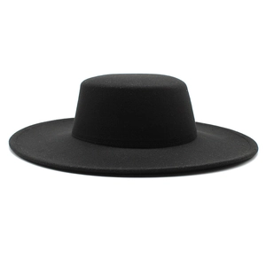 Detail view of the high-quality black wool felt boater hat with a wide flat 10cm brim
