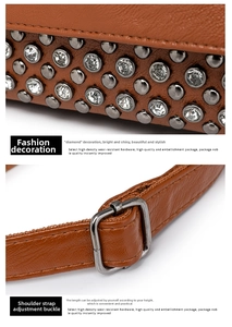 Detail of brown lychee leather bag with silver rivets and adjustable shoulder strap buckle