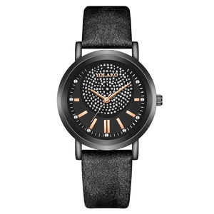 Montre à quartz pour femme avec cadran étoilé en strass et bracelet en cuir noir