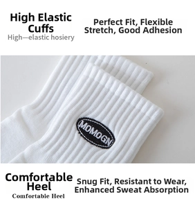 Close-up of white cotton crew socks showing the high-elastic ribbed cuff and embroidery