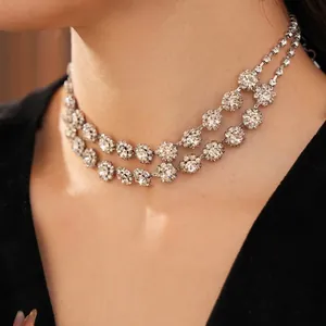 Luxurious double-layer rhinestone flower choker necklace with elegant fringe tassel details