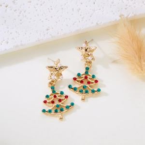 Detail of Christmas tree earrings with gold stars, pearls, and red green rhinestones