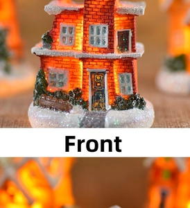 Detailed front view of a glowing resin Christmas miniature house with snowy textures