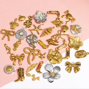 Mix of 33 gold and silver stainless steel bow and floral pendants for DIY jewelry making