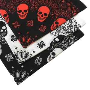 Three-pack cotton bandanas featuring skull prints and paisley patterns in red black and white