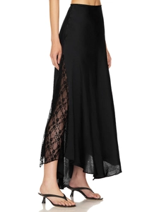 Detail of satin midi skirt with elegant floral lace panel and side slit design
