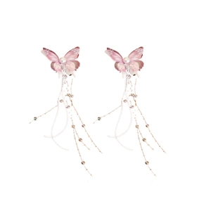 Pink butterfly hair clips with long tassels and pearls in a fairy aesthetic style