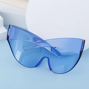 Macro detail of royal blue wrap around sports sunglasses with seamless oversized lens