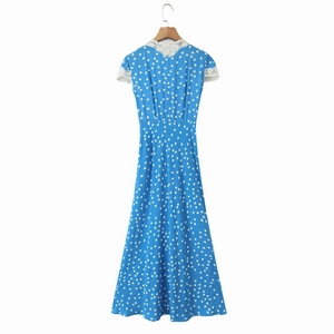 French retro sky blue polka dot dress with white lace collar on wooden hanger