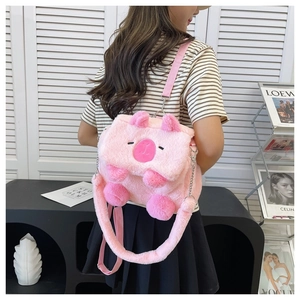 Pink plush cartoon animal backpack with adjustable straps and decorative chain