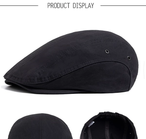 Close-up of black ivy cap showing breathable metal eyelets and elastic band detail