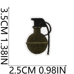 Detailed embroidery of a green grenade patch with dimensions in centimeters and inches