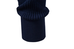 Close-up of high-quality navy blue ribbed knit cuffs on a men's polo sweater