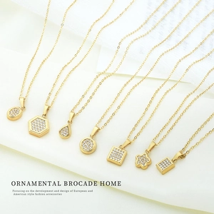 Collection of gold titanium steel necklaces with cubic zirconia geometric pendants