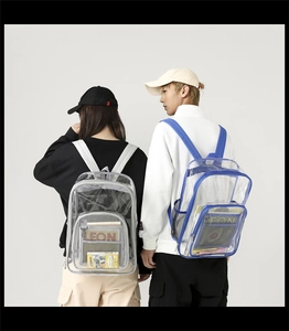 Detail showing the large capacity and waterproof PVC material of light grey and blue backpacks