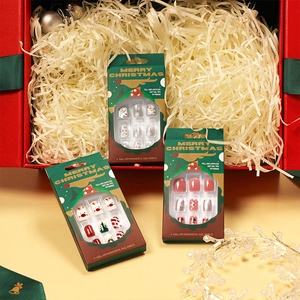 Christmas soft gel press-on nails set featuring festive snowman and deer art in gift box