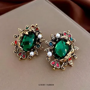 Baroque vintage emerald stud earrings with pearls in gold finish for women