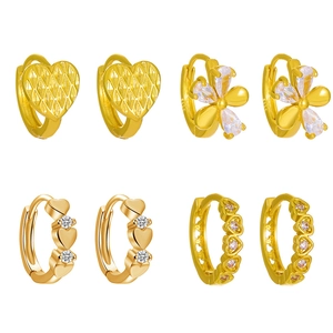 Minimalist gold flower and heart earring set with shimmering micro-pave cubic zirconia crystals