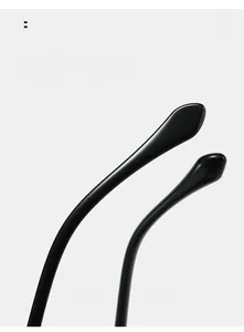 Detail of curved black resin sunglasses temple showing sleek arc design for comfort