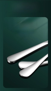 Macro view of ergonomic thickened stainless steel handle with polished finish and round edge