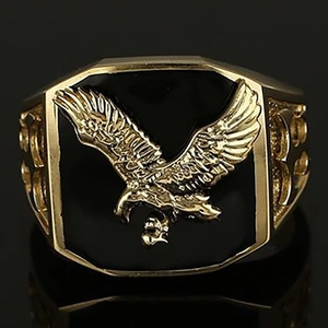 Vintage gold eagle ring for men with black square background and engraved relief
