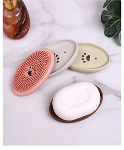 Silicone soap dish with cat paw drainage holes and cleaning brush in multiple colors