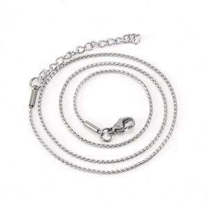 Silver stainless steel chain detail with lobster clasp and adjustable extender chain