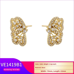 Detailed view of gold butterfly stud earrings with dimensions 15mm by 22mm and brass weight